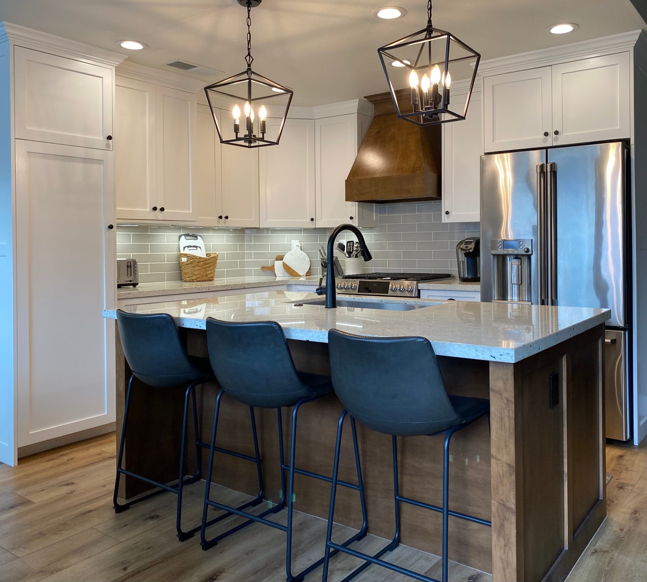 Finished custom home kitchen with premium cabinets, countertops, and modern finishes.