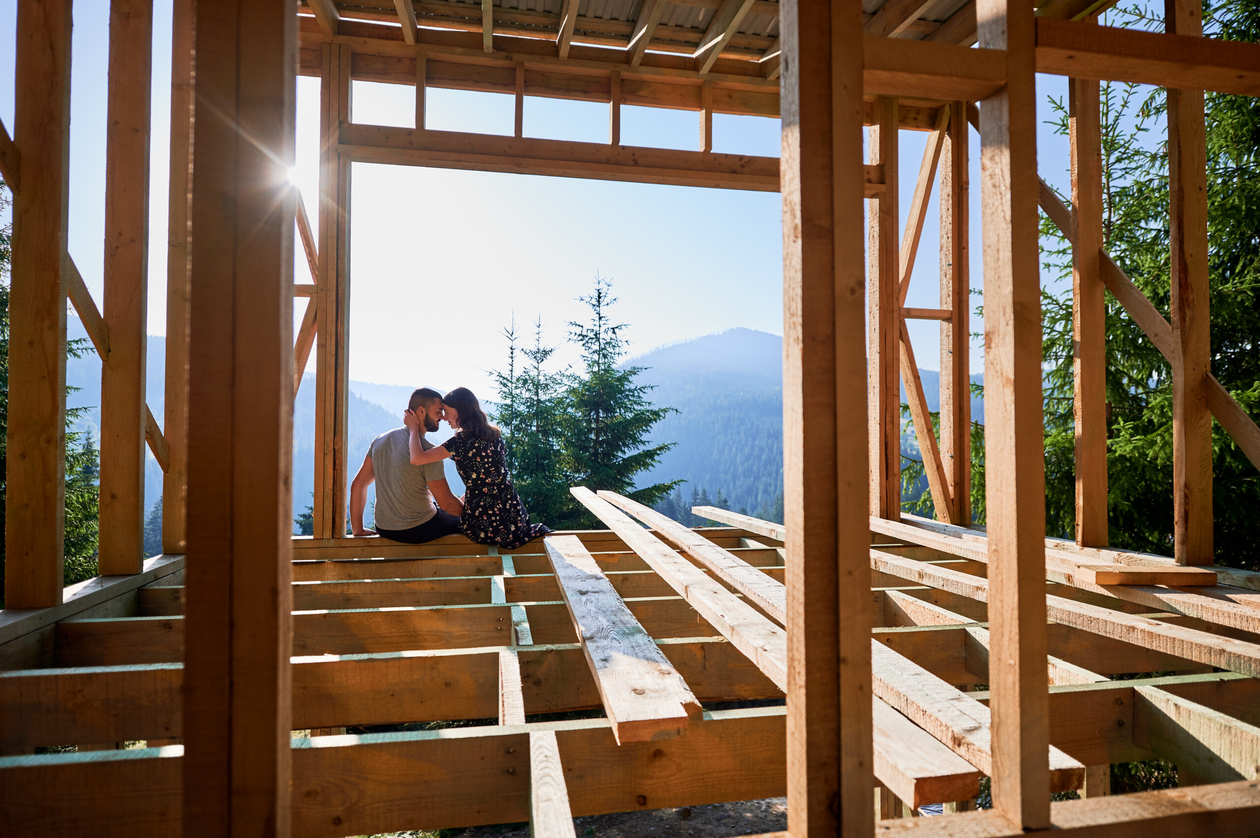 Builder inspecting the framing of a high quality custom home during construction.